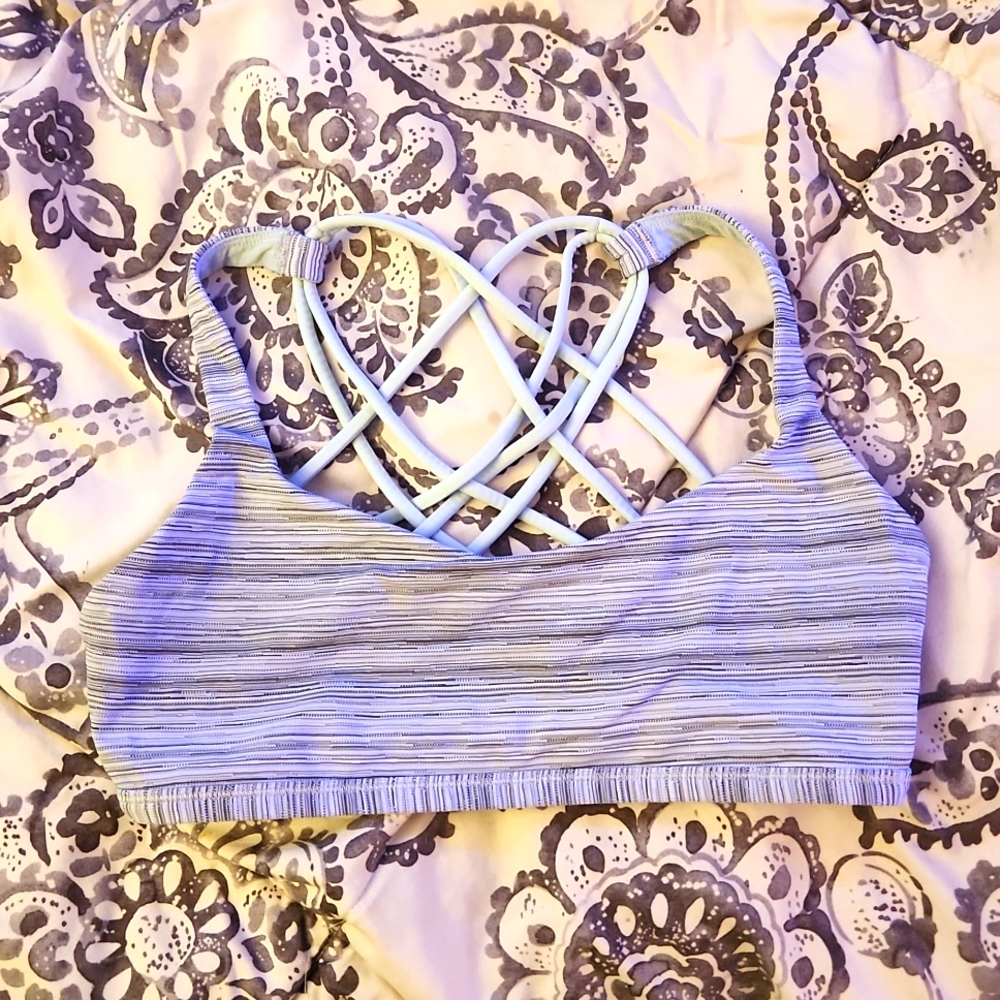 Grey and mint colored Lululemon sports bra